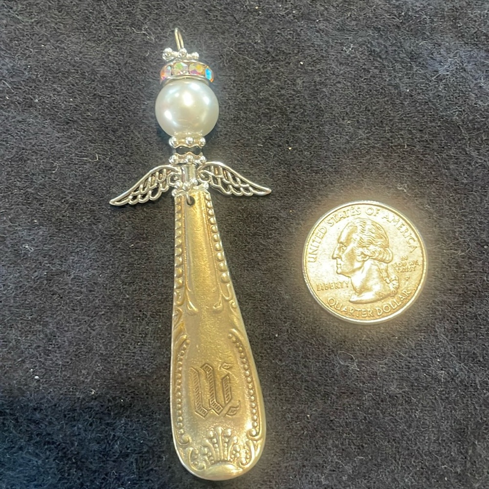 Handmade ornate silver angel pendant/ornament